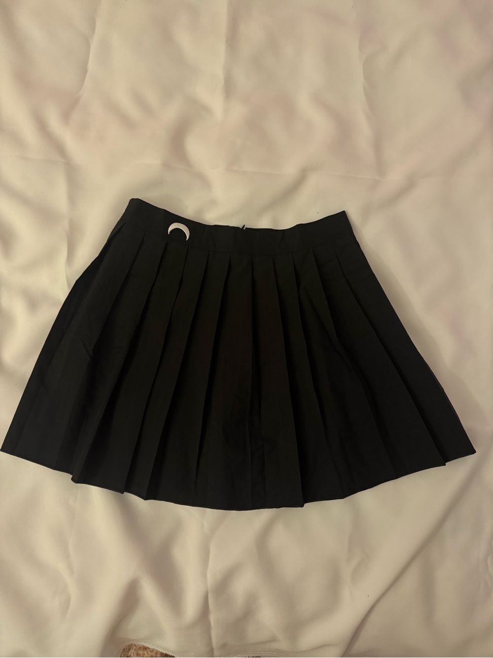 Black Pleated Mini Skirt with Silver Ring Accent